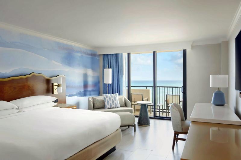 Pool & Partial Ocean View Deluxe Room
