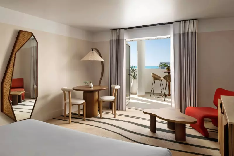 Deluxe Partial Ocean View Balcony Room